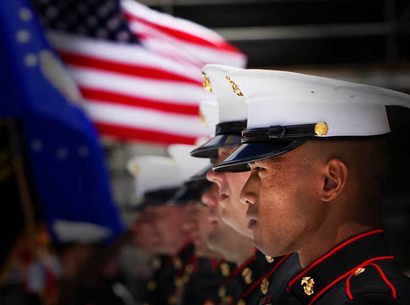 A line of marines stand at attention on Veterans Day Marines standing at attention