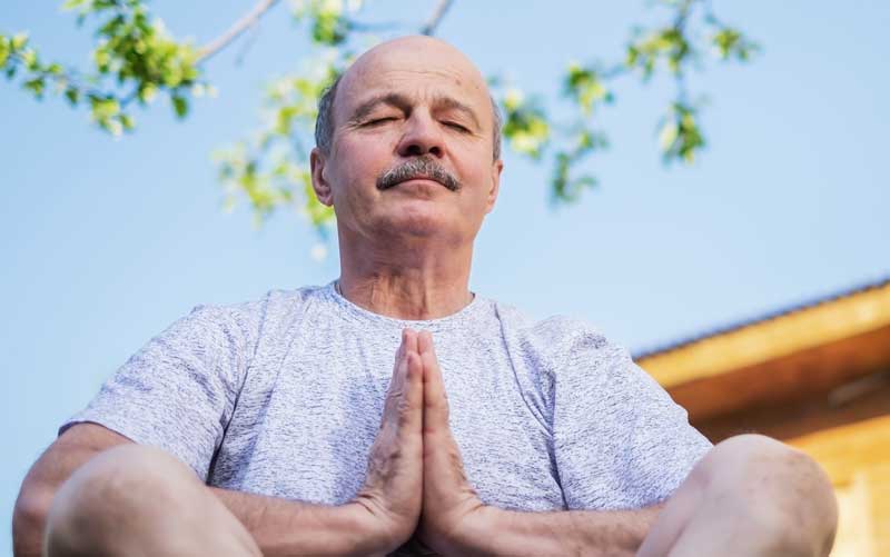 senior veteran meditates