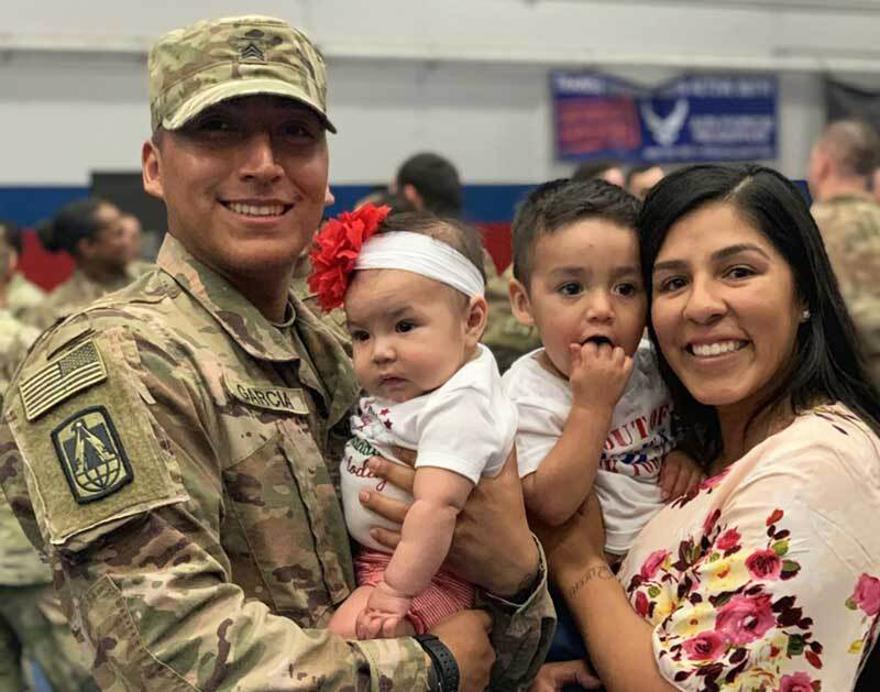 solider with his family