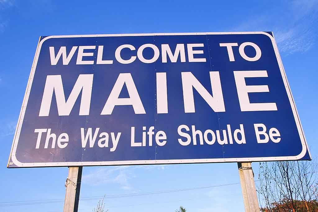 Welcome to Maine road sign.