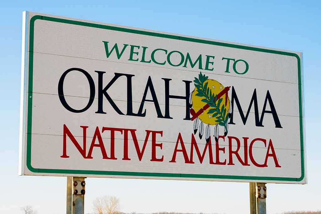 "Welcome to Oklahoma Native America" road sign.