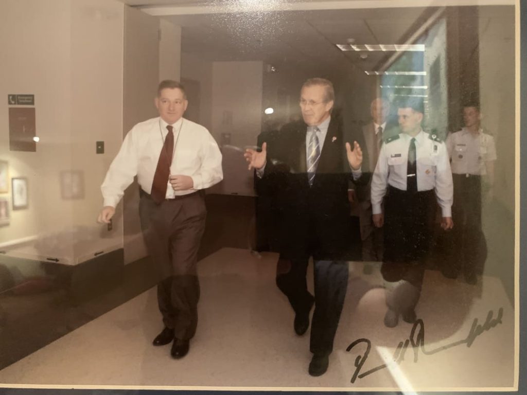 Lane and Secretary of Defense Donald Rumsfeld
