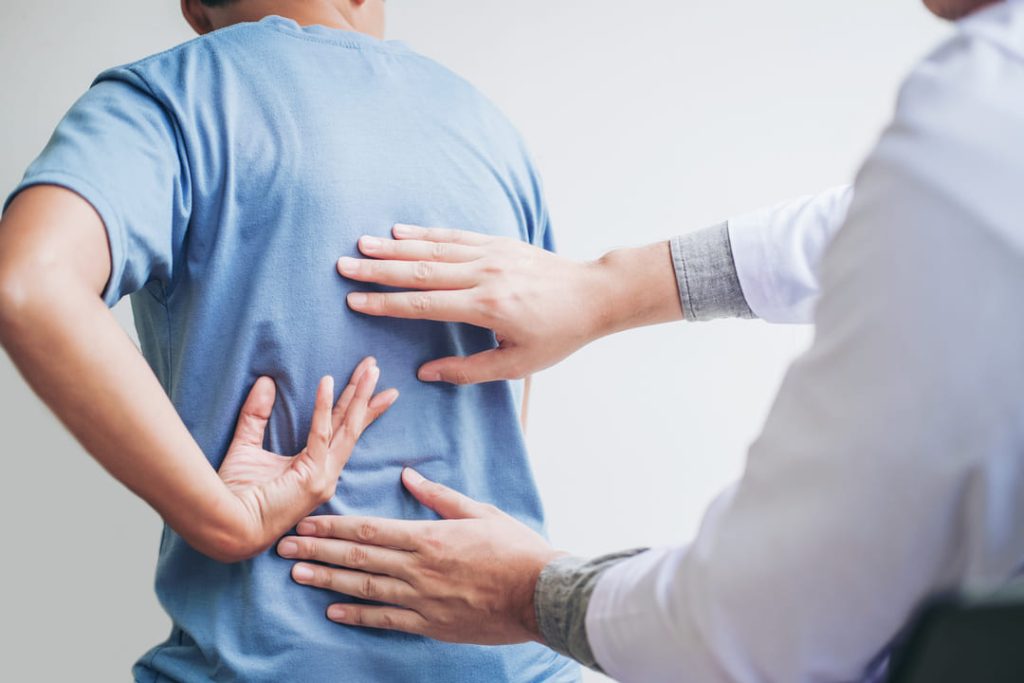 veteran visiting doctor for back pain