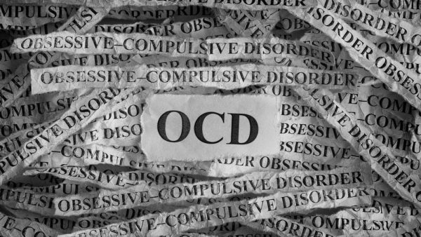 OCD sign with shredded paper all around it.